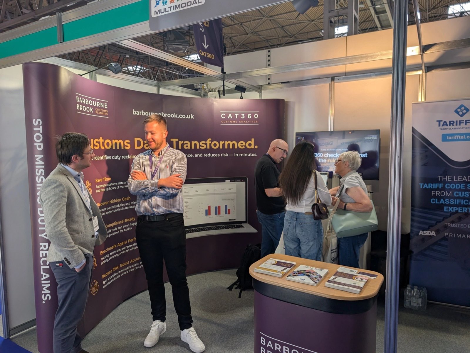 Visitors talking with the Barbourne Brook team on the CAT360 stand at Multimodal 2026.